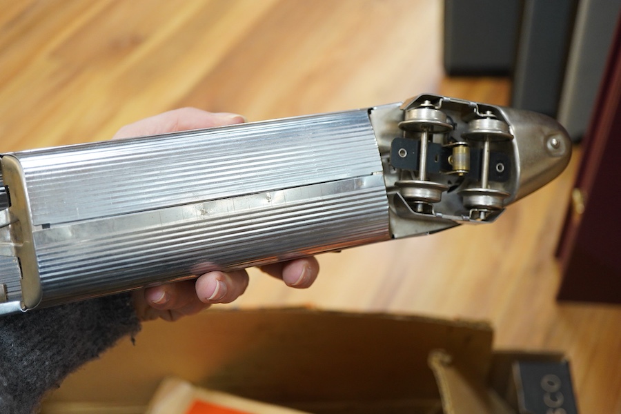 A boxed Lionel 0 gauge ‘Flying Yankee’ train set, comprising of a streamlined articulated diesel locomotive No.616, and three articulated chrome bogie cars; two No.617 and an observation car No.618, together with a boxed